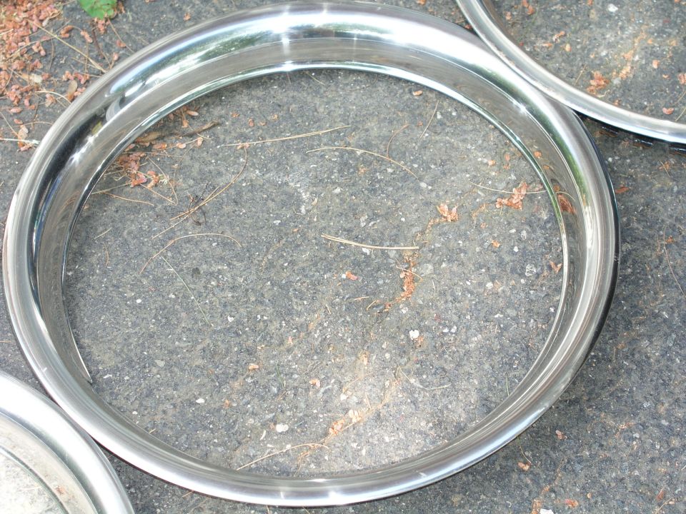 Chrome trim rings on asphalt