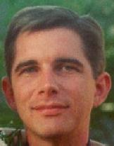 1991 Ford Bronco - Close-up of a man's face with a website address and company name overlaid on the image.