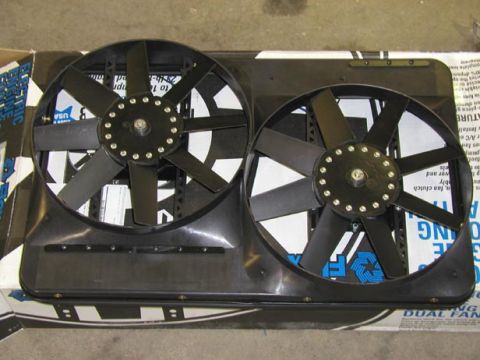 1988 Ford Bronco - A pair of black electric fans are shown, likely for a vehicle's cooling system.