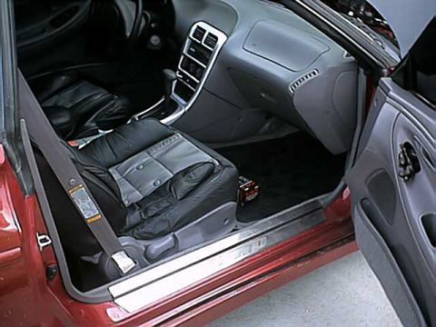 1994 Ford Probe - Interior view of a car, focusing on the driver's seat and dashboard area.