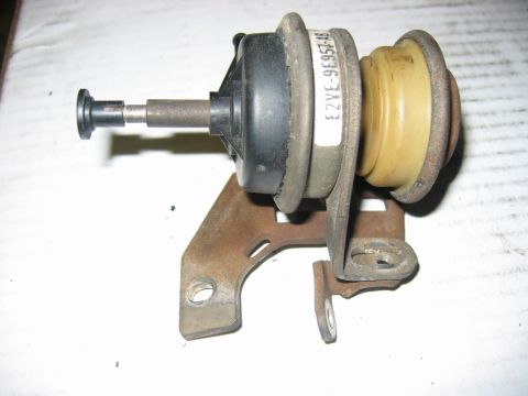1985 Ford Crown Victoria LTD - A close-up view of a vacuum actuator part, showing its mechanical components and a visible part number.