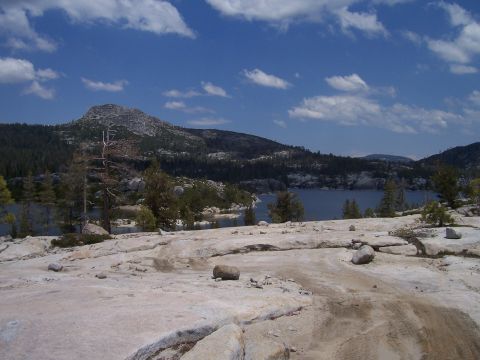 1998 Ford Ranger - A scenic view of a lake and mountains from a rocky outcrop on a clear day.