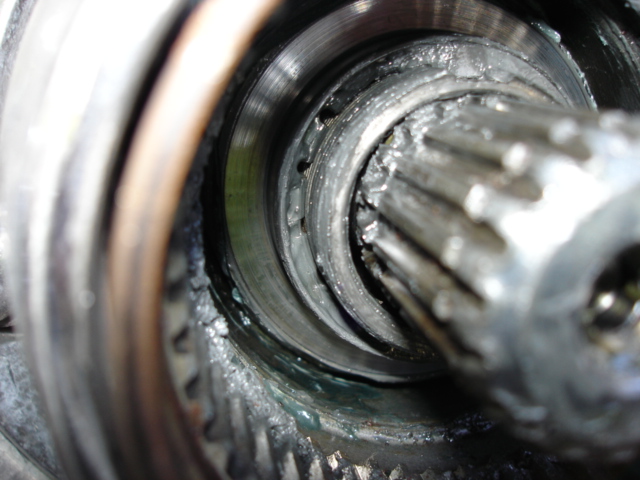Close-up of splined shaft and greased metal components