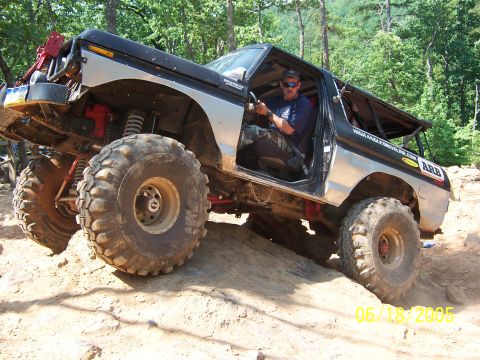 1978 Ford Bronco - This heavily modified 1978 Ford Bronco is navigating a challenging off-road course.