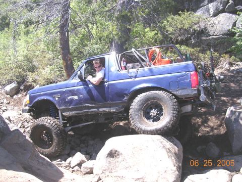 1994 Ford Bronco - A blue 1994 Ford Bronco navigates a challenging rocky trail on June 25, 2005.