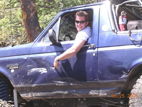 1994 Ford Bronco - Pointing at one of several new dents. the rocks were wet and slippery. i actually laid the bronco on its side into a rock (which prevented…