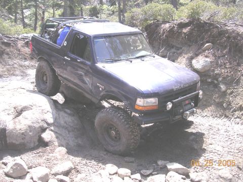 1994 Ford Bronco - This 1994 Ford Bronco is shown tackling a challenging rocky terrain on an off-road adventure.