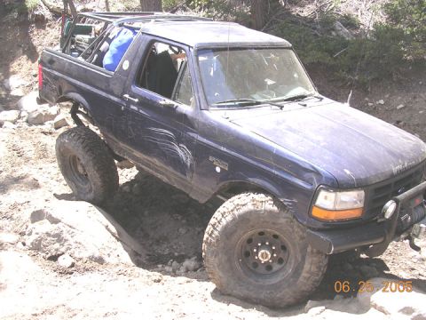 1994 Ford Bronco - This 1994 Ford Bronco is shown navigating a challenging rocky trail.