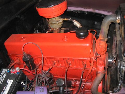 1986 Ford Bronco - Close-up view of a V8 engine bay, showing various components and wiring.