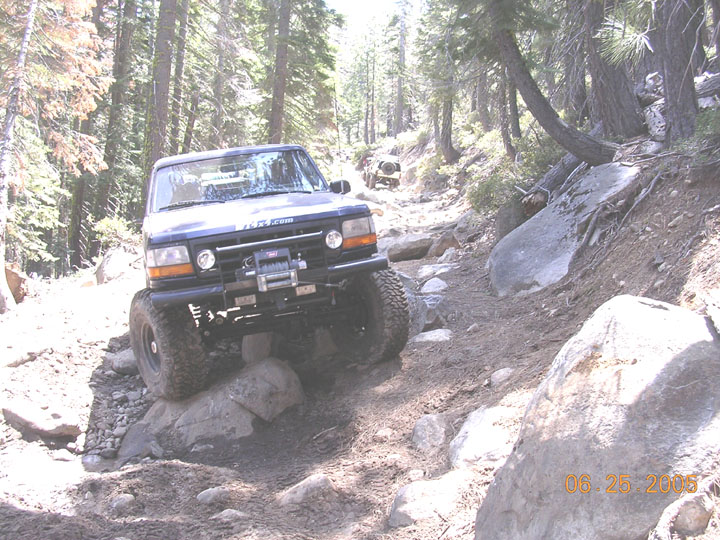 1994 Ford Bronco on a rocky trail, front view with winch