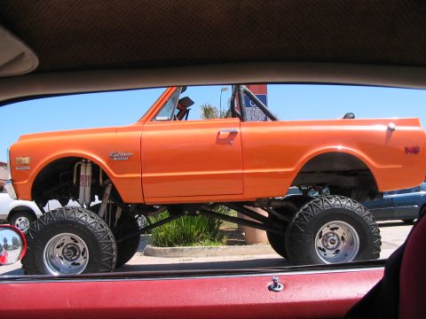 1986 Ford Bronco - This lifted K5 Blazer is modified for off-road use with large tires and suspension components.