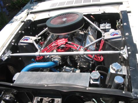 1986 Ford Bronco - Custom V8 engine bay with performance parts including MSD ignition and large air intake.