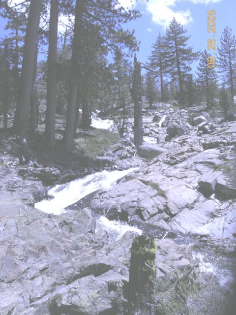 1994 Ford Bronco - A natural scene with a stream cascading over rocks in a wooded area, dated June 26, 2005.