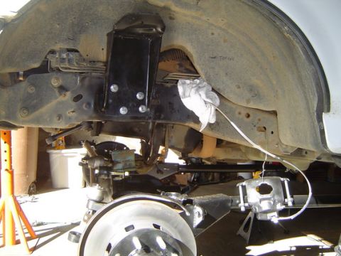 1995 Ford Bronco - shot before coil was in, and caliper not mounted yet. I had already pre-ground the caliper and mounting bracket to clearance 15" wheels.