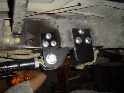 1995 Ford Bronco - cage radius arm and mounting bracket now sit about 3/4" inch in front of the e4OD xmember