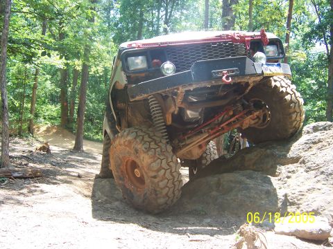 1978 Ford Bronco - This modified 1978 Ford Bronco navigates a challenging rocky trail during an off-road excursion.