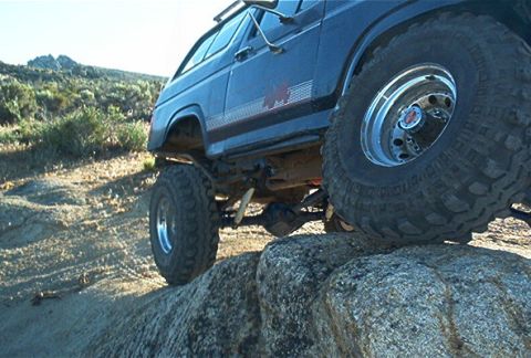 1986 Ford Bronco - This 1986 Ford Bronco is shown navigating a rocky off-road course.