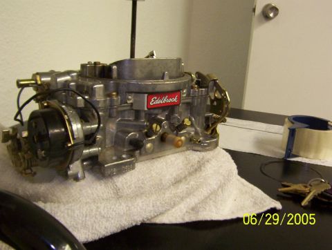1985 Ford Bronco - An Edelbrock carburetor is shown on a towel, with a date stamp of 06/29/2005 visible in the lower right corner.
