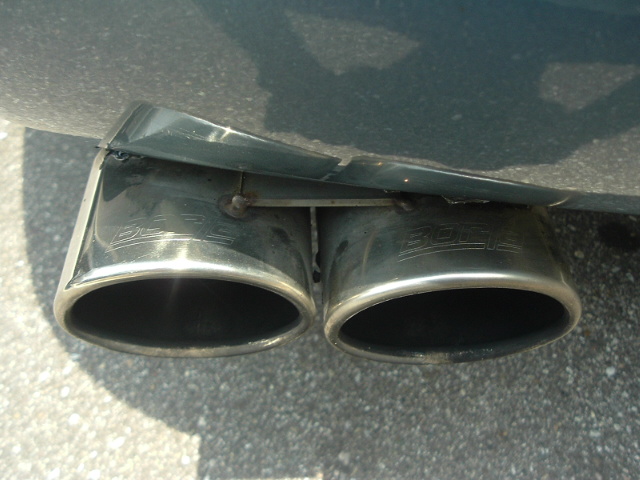 Dual exhaust tips with 'BOSS' branding visible