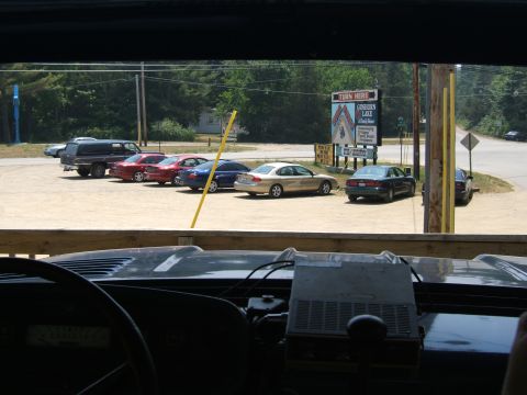1998 Ford Taurus - A 1998 Ford Taurus is seen parked in a lot next to other vehicles.