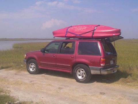 1999 Ford Explorer - This 1999 Ford Explorer is ready for an adventure with a kayak secured to its roof.