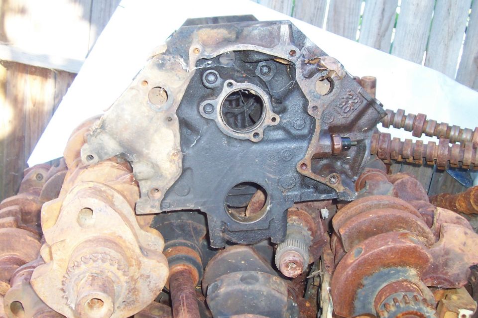 Engine block with crankshafts, rusty and disassembled