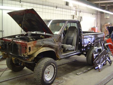 1989 Ford Ranger - This 1989 Ford Ranger is undergoing repairs with its hood and driver's door removed.