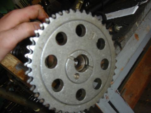 1986 Ford Mustang - Camshaft gear with visible teeth and mounting holes.