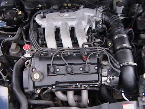1993 Ford Probe - Close-up view of a Ford V6 engine, showing the intake manifold and valve covers.