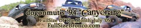 1994 Ford Bronco - Three 1994 Ford Broncos tackle a rocky off-road course, as indicated by the text overlay.