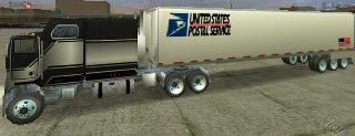 2000 Ford Crown Victoria - A semi-trailer truck with a United States Postal Service trailer is parked on a paved surface.