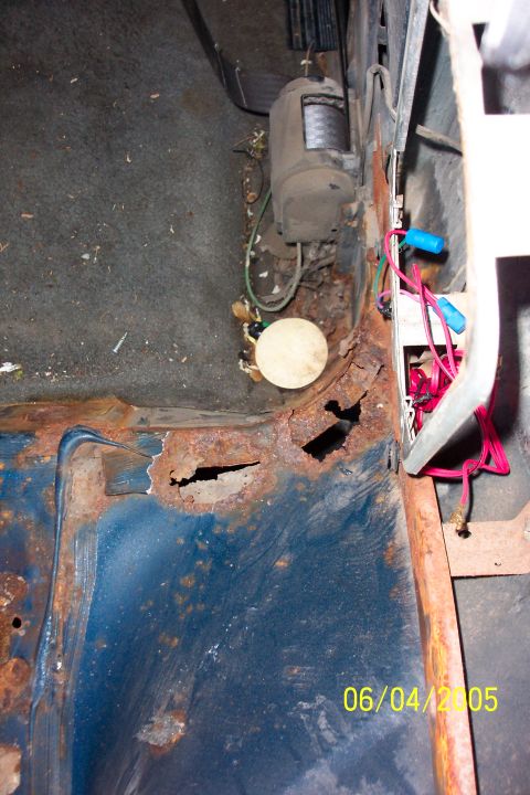 1988 Ford Bronco - Holes in body behind passenger seat.