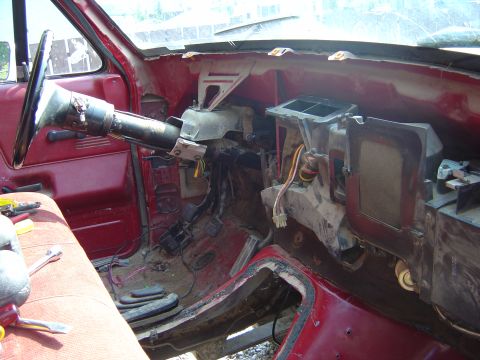 1986 Ford F-150 - Interior of a 1986 Ford F-150 with the dashboard removed for repairs or modifications.