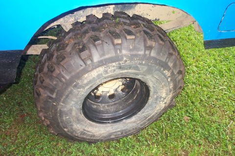 1987 Ford Bronco - Off-road tire and fender detail.