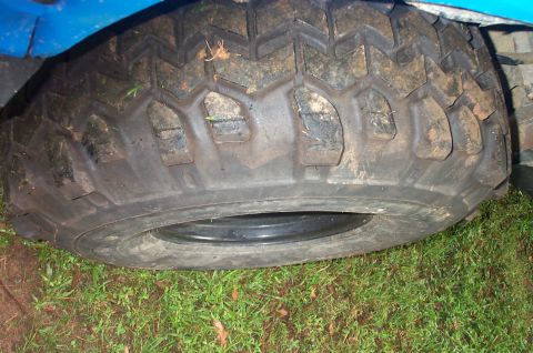 1987 Ford Bronco - This photo shows a close-up of a off-road tire, not specific year or model details of the vehicle.