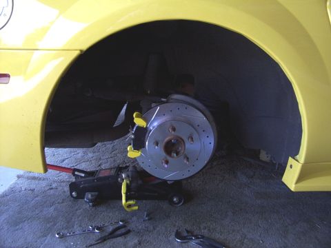 2002 Ford Mustang - Caliper bracket and new Ceramic pads installed