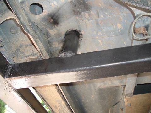 1989 Ford Bronco - Close-up view of the undercarriage, showing a roll cage and exhaust system, with a Supermotors.net watermark.