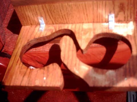 1990 Ford Bronco - Custom wooden dual cup holder installed in a vehicle's interior.