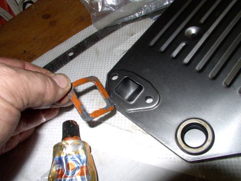 1986 Ford Bronco - Dap a little sealant on the small square gasket just to keep it in place while you install the filter housing. Without that gasket your pum…