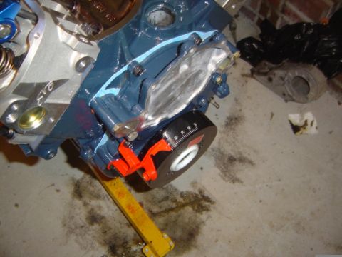 1986 Ford Bronco - Close-up of an engine block assembly with a timing pointer, likely during a swap or rebuild.