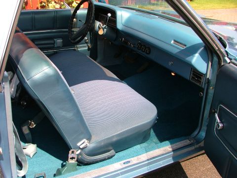1970 Ford Ranchero - The interior of a 1970 Ford Ranchero features blue upholstery and dashboard details.