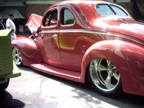 1995 Ford Probe - Custom red hot rod coupe with a chopped roof and chrome wheels.