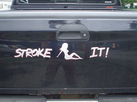 1981 Ford Bronco - Tailgate sticker on a black truck reads "STROKE IT!" with a woman's silhouette.