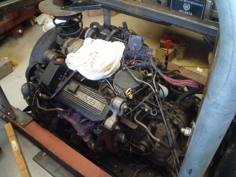 1981 Ford Bronco - Close-up view of a V8 engine, showing its complex internal components and external wiring.
