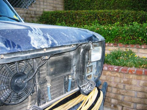 1985 Ford Bronco - Front view of a 1985 Ford Bronco showing damage to the hood and front fascia.