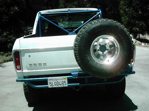 1978 Ford Bronco - This 1978 Ford Bronco features a custom blue roll cage and a rear-mounted spare tire carrier.