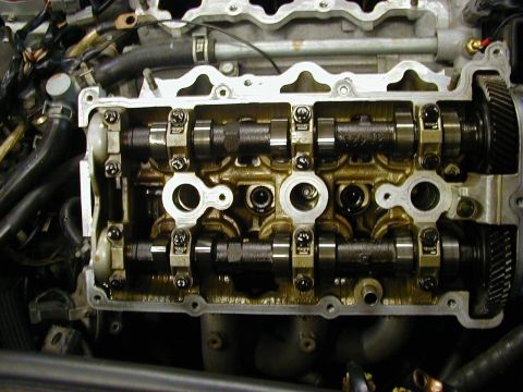 1994 Ford Probe - Close-up view of an engine's internal components, showing camshafts and valve train.