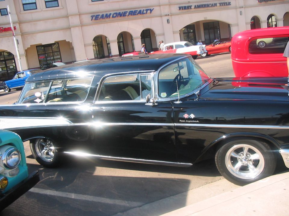 Black 1957 Chevrolet Nomad station wagon, side view