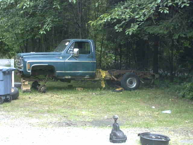1973-1974 Chevrolet C/K Pickup chassis with cab, missing front wheels and bed