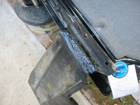 1995 Ford Bronco - i cut the pasenger side of the skid and shortened it. now it tucks up much better. i still need to figure out how to get the flanges on the…